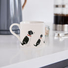 Sweet William Springer Spaniel (Black & White) Mug in a kitchen setting — illustrated Springer Spaniel ceramic mug
