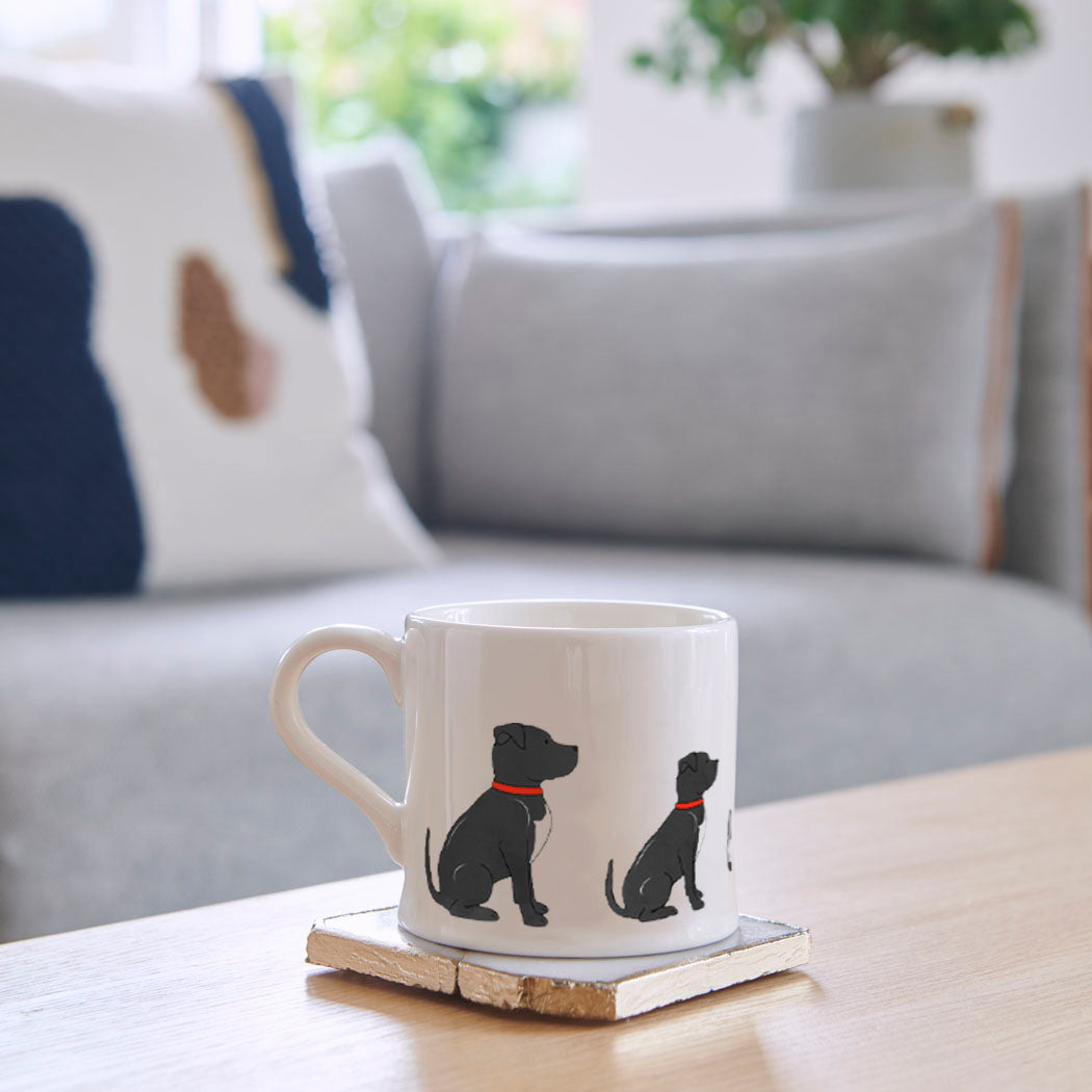 Sweet William Staffie / Staffordshire Bull Terrier Mug on a coffee table — illustrated repeat pattern ceramic mug