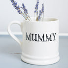 Simple ceramic Mummy mug by Sweet William Designs, styled with lavender stems, a thoughtful gift for Mum