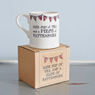 Ceramic mug with Union Jack bunting on its kraft box, showing “Nice cup of tea and a slice of Battenburg”, a perfect gift for tea and cake lovers