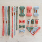 Coordinating orange, green and grey tweed dog accessories including bandanas, collars, leads, bow ties, toys and poo bag holders by Sweet William Designs