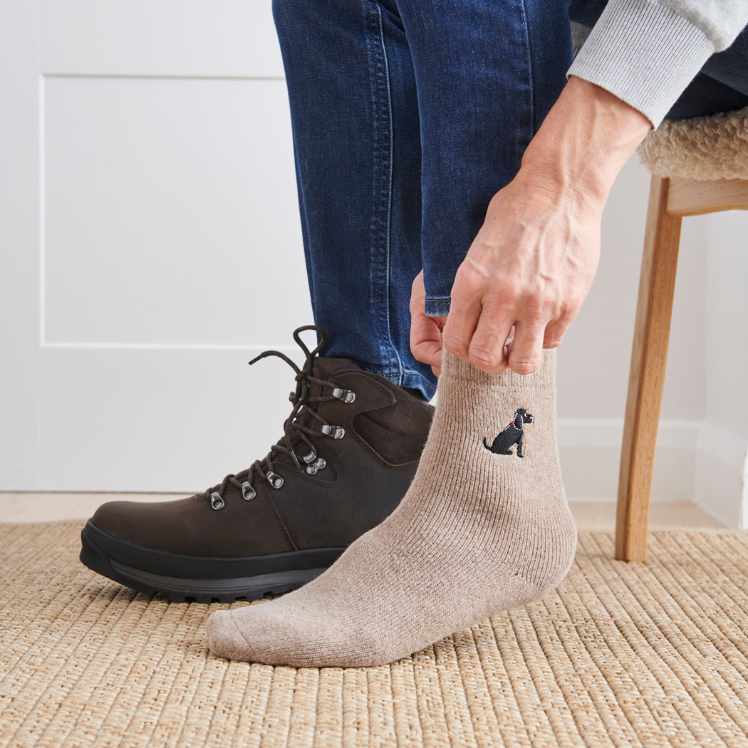 Man wearing Black Cocker Spaniel dog walking socks — embroidered wool blend, unisex gift for dog lovers