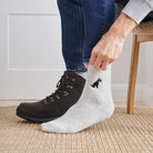Man wearing Black Schnauzer dog walking socks — embroidered wool blend, unisex gift for dog lovers