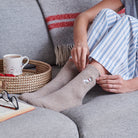 Relaxing in Westie dog walking socks — cosy wool blend socks, ideal gift for West Highland Terrier owners