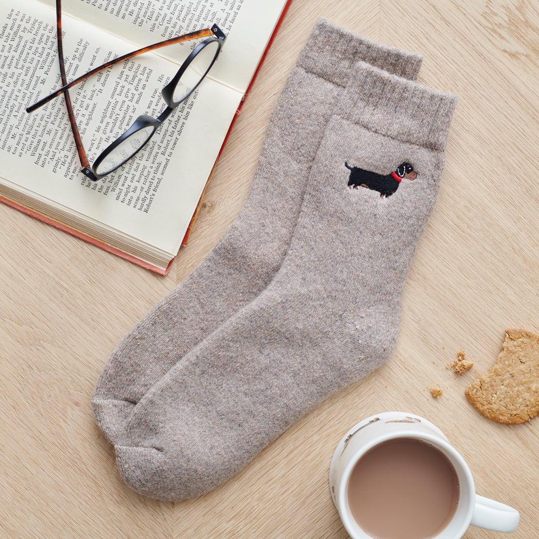 Dachshund socks laid flat — embroidered unisex wool blend socks, one size fits UK 3–12
