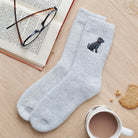 Staffie dog walking socks laid flat — embroidered unisex wool blend socks, one size fits UK 3–12