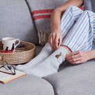 Hare wool socks worn while relaxing, cosy countryside-inspired socks for nature lovers by Sweet William Designs