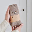 Basset Hound socks in hand – embroidered wool dog lover gift