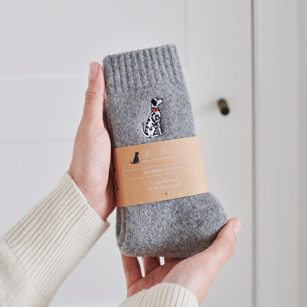 Dalmatian embroidered socks held in hand — soft wool blend dog lover gift by Sweet William Designs