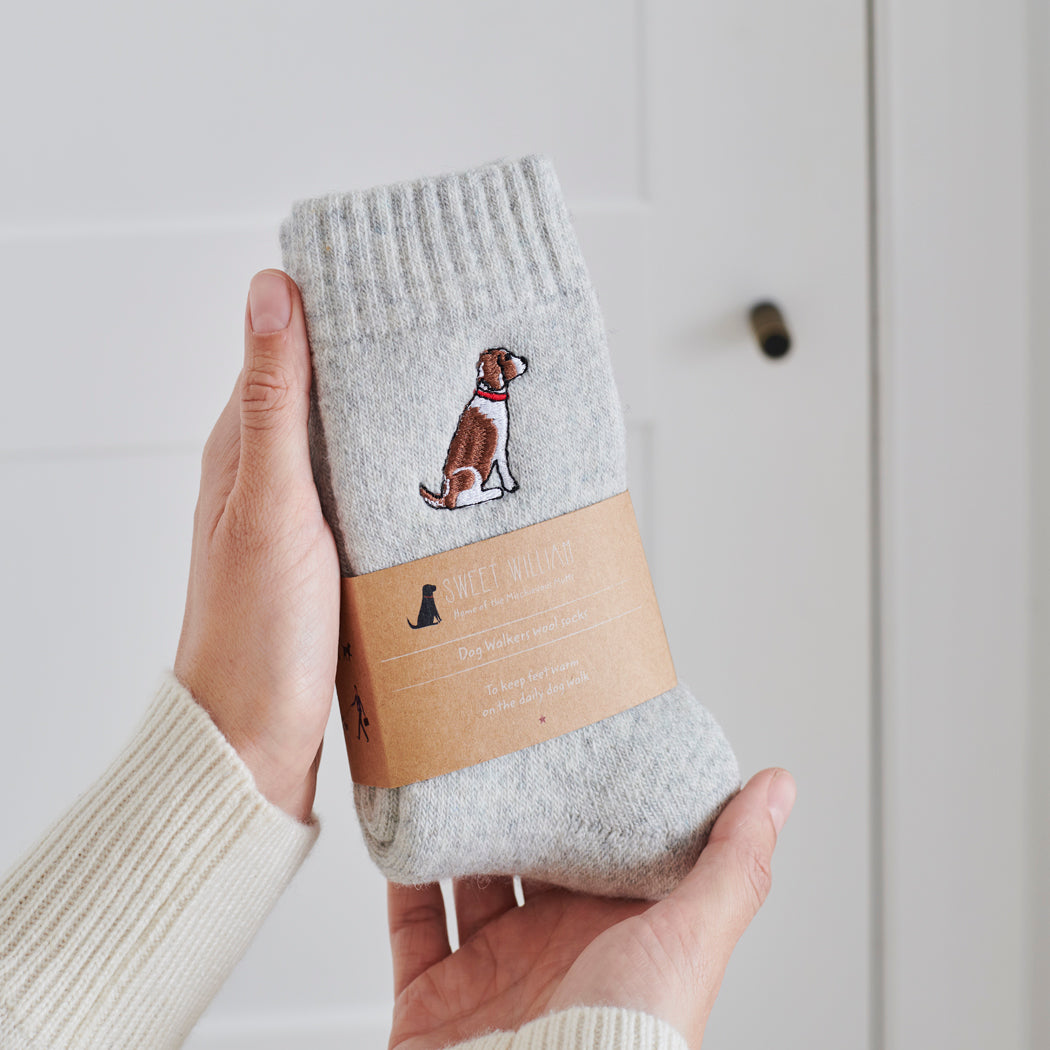 Liver & White Springer Spaniel embroidered socks held in hand — soft wool blend dog lover gift by Sweet William Designs