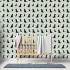 Sweet William Designs Black Labrador wallpaper styled in nursery — sage green repeat pattern