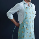 Pug apron in organic cotton canvas with screen-printed repeat Pug illustration — a perfect gift for Pug lovers by Sweet William Designs