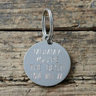 Personalised silver-plated brass tag engraved with custom message — can be used as a dog tag or keyring, thoughtful dog lover gift