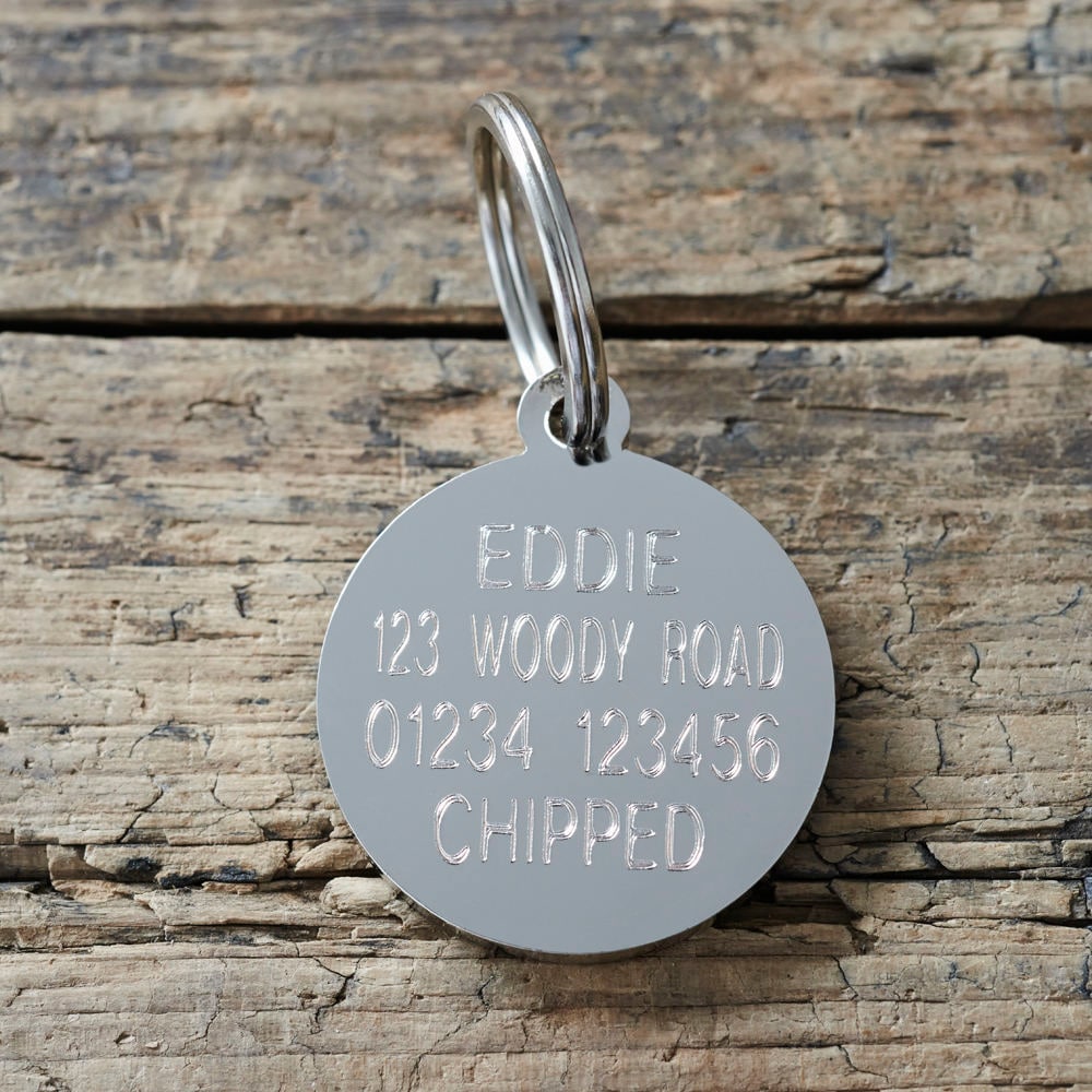 Reverse of personalised dog ID tag engraved with dog's name, address and phone number — solid silver-plated brass, personalised dog tag by Sweet William Designs