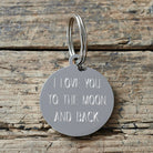Personalised silver-plated brass tag engraved with custom message — can be used as a dog tag or keyring, thoughtful dog lover gift