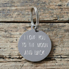 Personalised silver-plated brass tag engraved with custom message — can be used as a dog tag or keyring, thoughtful dog lover gift