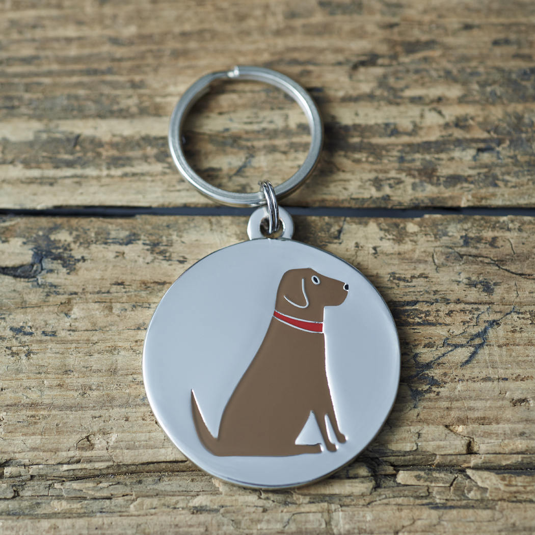 Close-up of Chocolate Labrador dog ID tag — silver-plated brass with illustrated Chocolate Lab design, personalised dog tag by Sweet William Designs