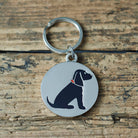 Close-up of Black Cocker Spaniel dog ID tag — silver-plated brass with illustrated Black Cocker Spaniel design, personalised dog tag by Sweet William Designs