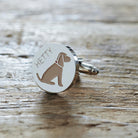 Close-up of personalised Golden Cocker Spaniel cufflink engraved with name on rustic wood — silver-plated gift for Cocker Spaniel owners