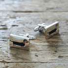 Pair of Dachshund cufflinks on rustic wood — silver-plated with illustrated Dachshund and red collar, T-bar fastening, dog lover gift