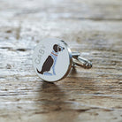 Close-up of personalised Liver & White Springer Spaniel cufflink engraved with name on rustic wood — silver-plated gift for Springer Spaniel owners