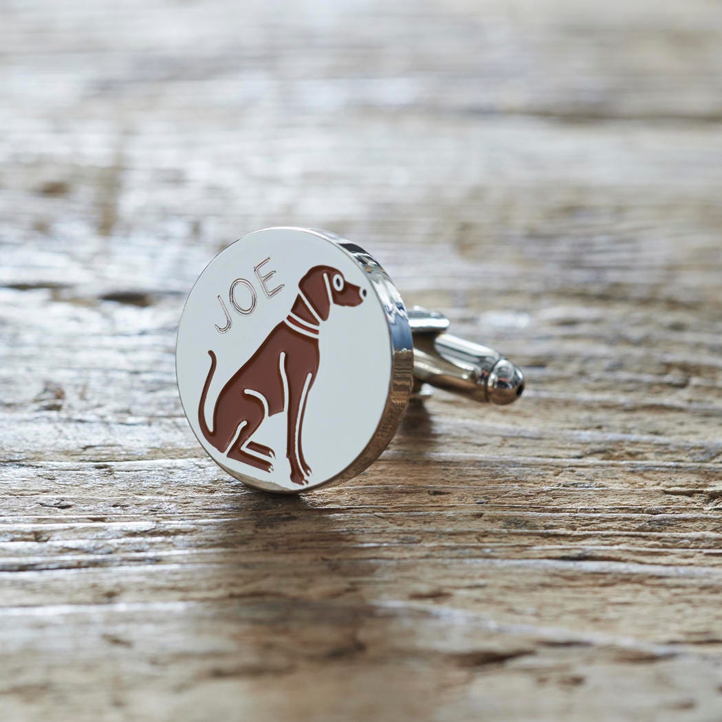 Close-up of personalised Vizsla cufflink engraved with name on rustic wood — silver-plated gift for Vizsla owners