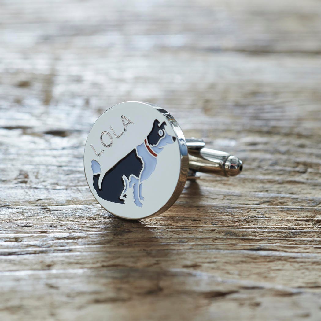 Close-up of personalised Border Collie cufflink engraved with name on rustic wood — silver-plated gift for Border Collie owners
