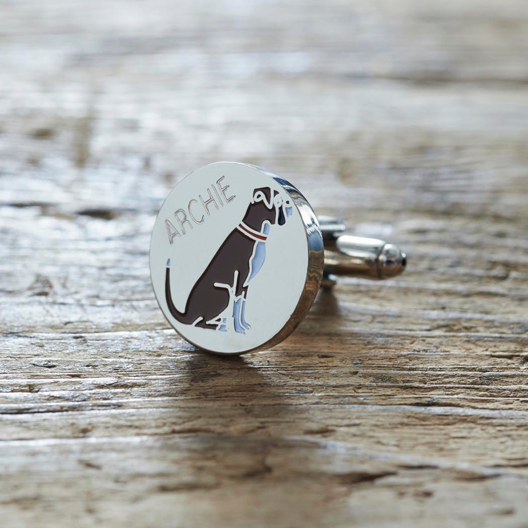 Close-up of personalised Boxer cufflink engraved with name on rustic wood — silver-plated gift for Boxer owners