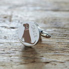 Close-up of personalised Chocolate Labrador cufflink engraved with name on rustic wood — silver-plated gift for Chocolate Lab owners