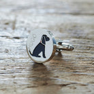 Close-up of personalised Black Cocker Spaniel cufflink engraved with name on rustic wood — silver-plated gift for Cocker Spaniel owners
