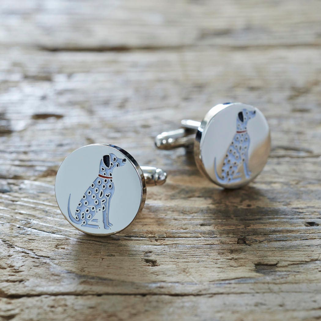 Pair of Dalmatian cufflinks on rustic wood — silver-plated with illustrated Dalmatian and red collar, T-bar fastening, dog lover gift
