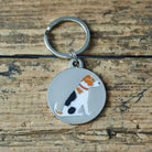 Close-up of Jack Russell dog ID tag — silver-plated brass with illustrated Jack Russell design, personalised dog tag by Sweet William Designs