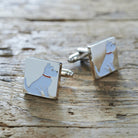 Pair of Westie cufflinks on rustic wood — silver-plated with illustrated West Highland Terrier design, T-bar fastening, dog lover gift