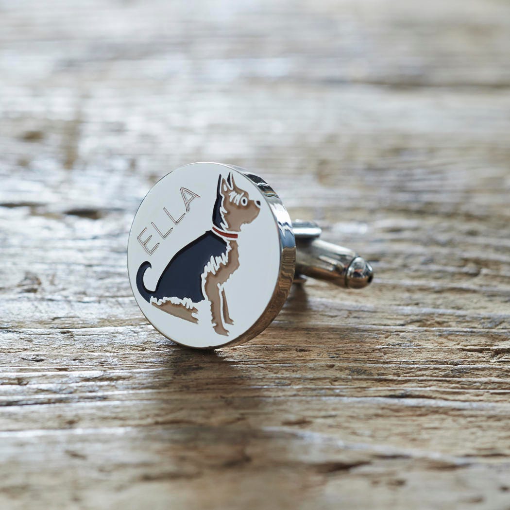 Close-up of personalised Yorkshire Terrier cufflink engraved with name on rustic wood — silver-plated gift for Yorkie owners