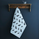 Black Schnauzer tea towel in thick organic cotton — screen printed Black Schnauzer illustration, kitchen gift for dog lovers by Sweet William Designs