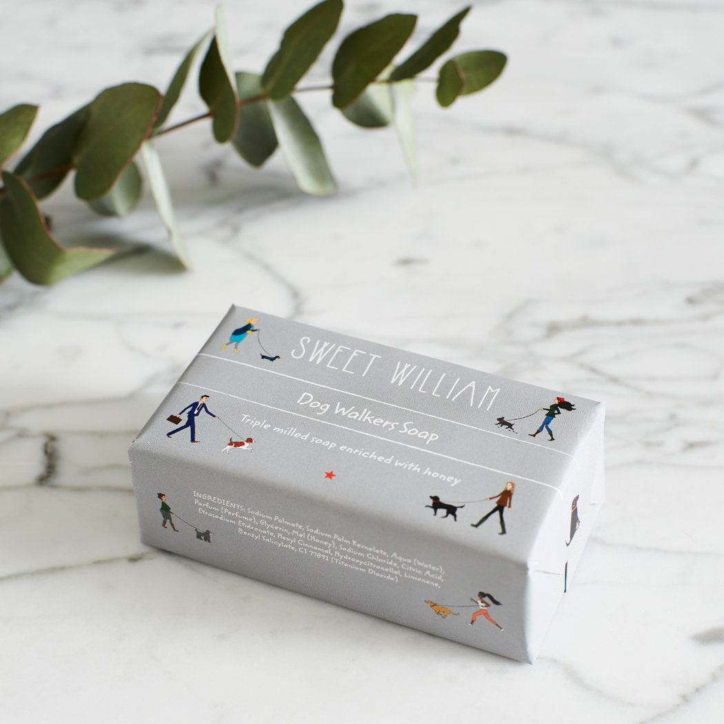 Sweet William Dog Walkers Revival Soap in grey illustrated wrap on marble — triple milled soap enriched with honey, gift for dog walkers