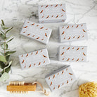 Collection of Beagle triple milled soaps on marble surface — honey-enriched luxury dog lover gift by Sweet William Designs