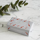 Liver & White Springer Spaniel triple milled soap on marble surface — honey-enriched luxury soap in Liver & White Springer Spaniel illustrated packaging by Sweet William Designs
