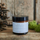 Dog Walkers Revival Foot Cream on rustic wooden surface with pine cone and moss — thoughtful gift for dog walkers by Sweet William Designs