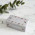 Beagle triple milled soap on marble surface — honey-enriched luxury soap in Beagle illustrated packaging by Sweet William Designs