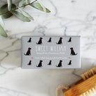 Close-up of Black Labrador soap packaging — Sweet William triple milled soap enriched with honey, featuring an illustrated Black Labrador repeat pattern