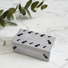 French Bulldog triple milled soap on marble surface — honey-enriched luxury soap in French Bulldog illustrated packaging by Sweet William Designs