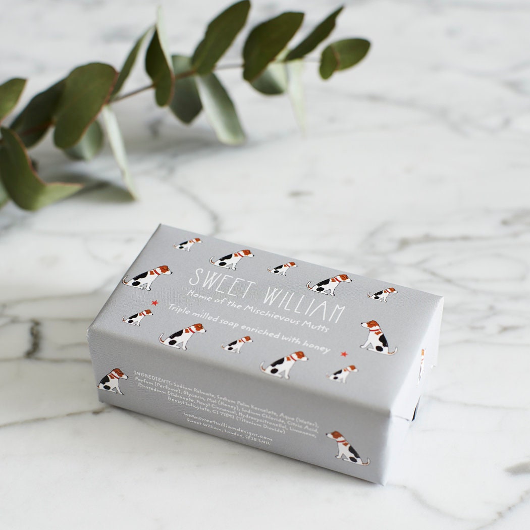 Jack Russell triple milled soap on marble surface — honey-enriched luxury soap in Jack Russell illustrated packaging by Sweet William Designs