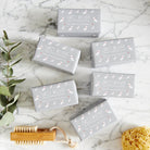 Collection of Westie triple milled soaps on marble surface — honey-enriched luxury dog lover gift by Sweet William Designs