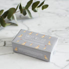 Yellow Labrador triple milled soap on marble surface — honey-enriched luxury soap in Yellow Labrador illustrated packaging by Sweet William Designs