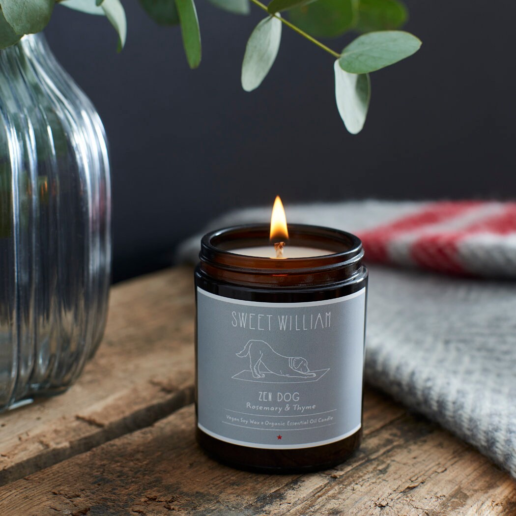 Lit Zen Dog soy wax candle in amber jar — rosemary and thyme scented, relaxing dog lover gift by Sweet William Designs