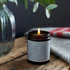 Lit Christmas Dog soy wax candle in amber jar — orange, cinnamon and clove scented, cosy dog lover Christmas gift by Sweet William Designs