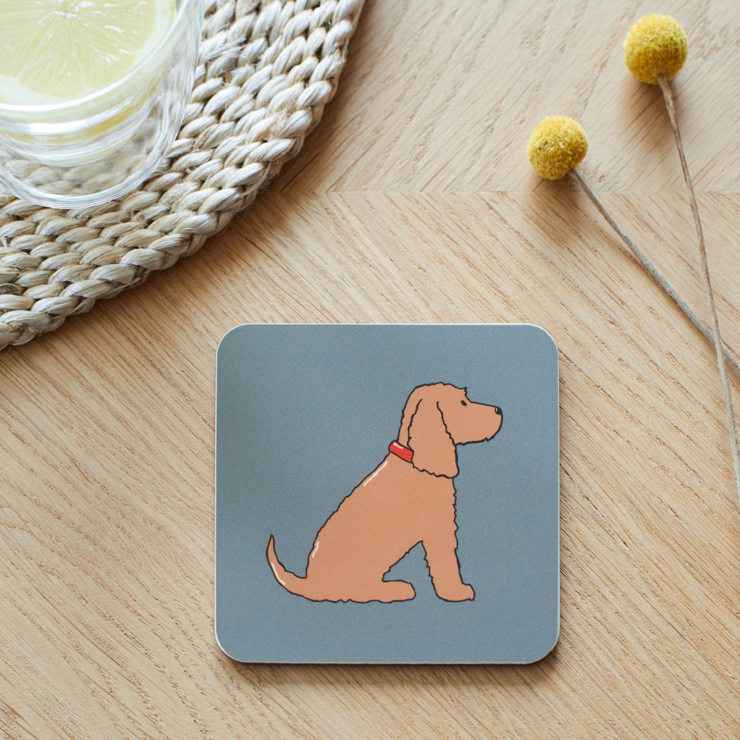 Close-up of Golden Cocker Spaniel coaster — sustainably sourced eucalyptus wood with cork backing, heat-resistant and easy to wipe clean