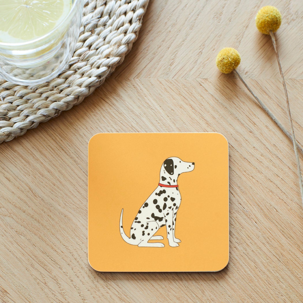 Close-up of Dalmatian coaster — sustainably sourced eucalyptus wood with cork backing, heat-resistant and easy to wipe clean