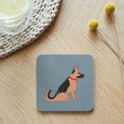 Close-up of German Shepherd coaster — sustainably sourced eucalyptus wood with cork backing, heat-resistant and easy to wipe clean